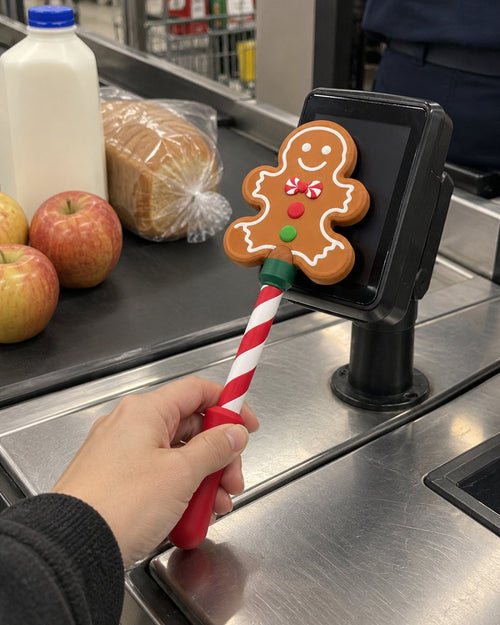Gingerbread Man wand at a grocery checkout